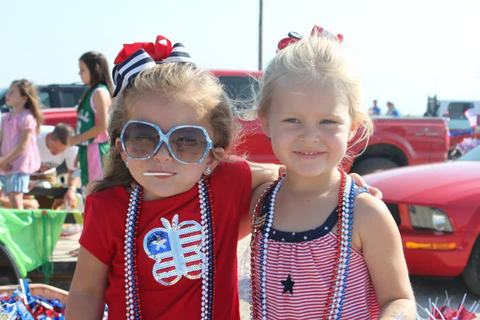 Two little girls in red, white and blue beads