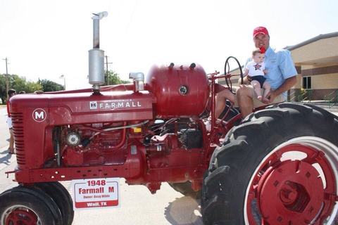 Restored red Farmall tractor