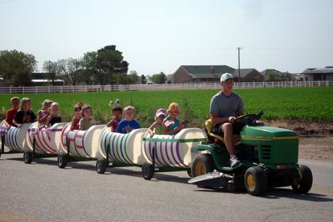 Barrel train ride full of kids
